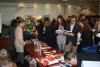 Coffee break - conference participants looking at brochures